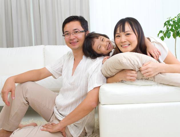 Indoor portrait of asian family